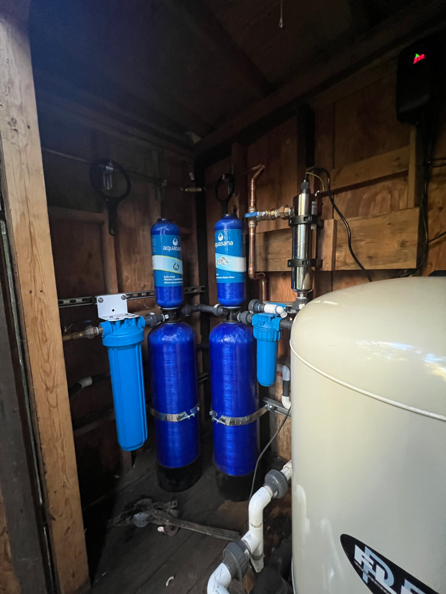 Whole-house water filtration and softener system installation